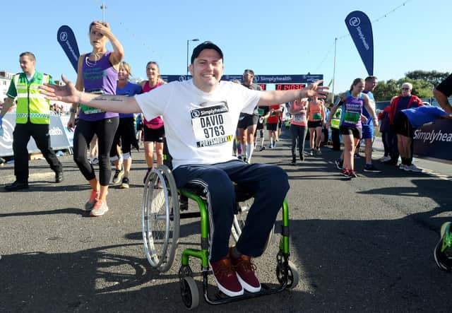 David Williamson at the finish line of the 2018 Great South Run.
Picture: Sarah Standing (180800-7401)