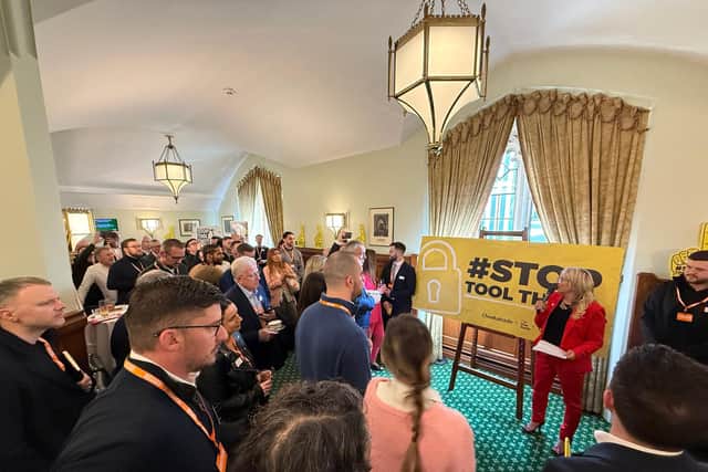Amanda addressing a packed out reception with experts, industry bosses and tradespeople
