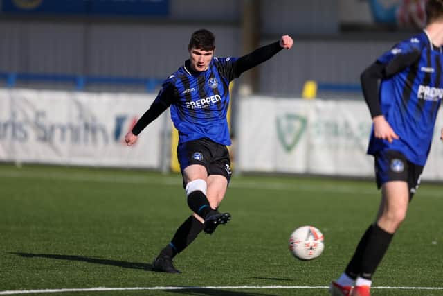 Clanfield go for goal. Picture by Alex Shute