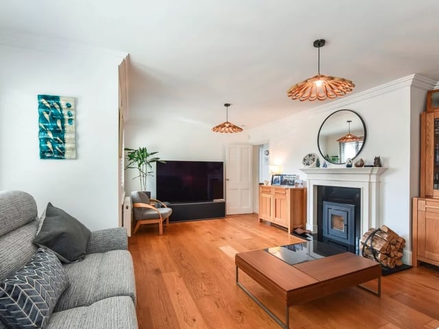 This property comes with five bedrooms,  four bathrooms and two reception rooms as well as a large garden and a swimming pool.