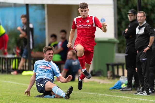 Ben Anderson, right, was on target as Horndean won 3-2 at AFC Portchester in the Wessex League Cup. Picture: Keith Woodland