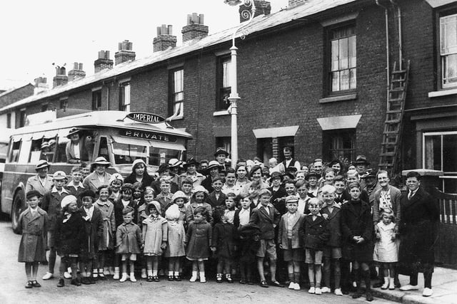 The calm before the storm. The residents of Goodwood Road, Southsea, off on their summer outing to Purbrook in July 1939.
