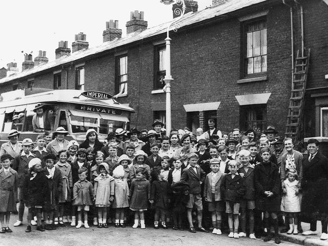 The calm before the storm. The residents of Goodwood Road, Southsea, off on their summer outing to Purbrook in July 1939.