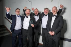 (L-r) Vince Noyce, Giles Callaghan, Josh Callaghan and Dich Oatley of The Portsmouth Distillery, winners of Start-Up Business of the Year, with Christopher Worrall of category sponsor University of Portsmouth at The News Business Excellence Awards 2020 at Portsmouth Guildhall