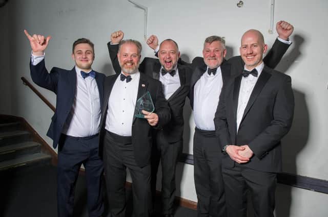 (L-r) Vince Noyce, Giles Callaghan, Josh Callaghan and Dich Oatley of The Portsmouth Distillery, winners of Start-Up Business of the Year, with Christopher Worrall of category sponsor University of Portsmouth at The News Business Excellence Awards 2020 at Portsmouth Guildhall
