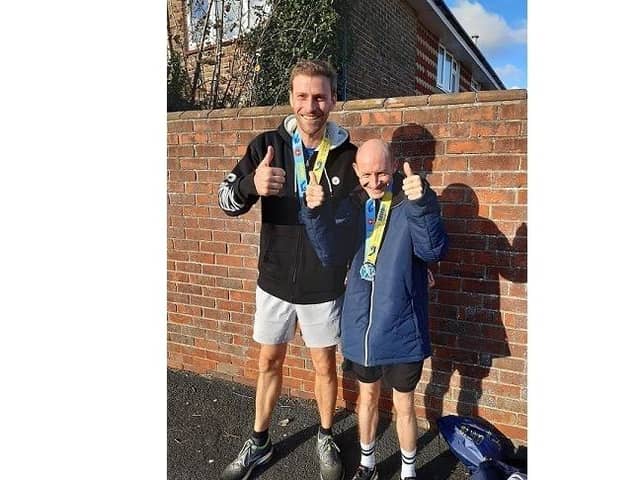 Shane Grant, 39, from Portsmouth who is taking on the London marathon, pictured with his guide runner Lawrence Patterson