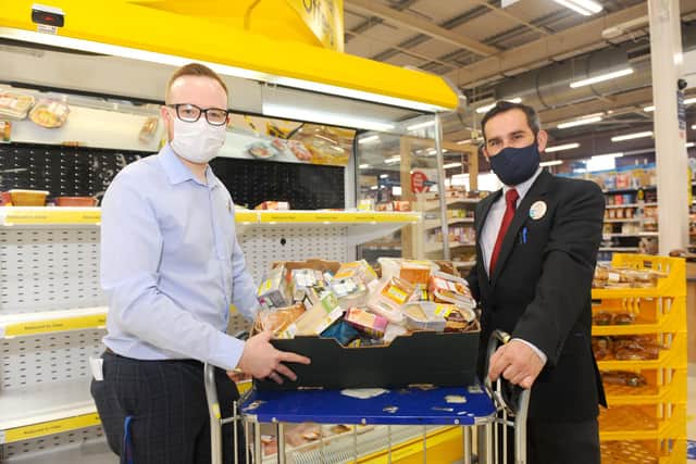 Tesco has teamed up with food waste app Olio and is preventing food from going to waste.
Pictured is: (l-r) Matt Rice-Smith, lead trade manager, and Grzegorz Zdybel, fresh food manager at Tesco in Fareham.
Picture: Sarah Standing (161020-6012)