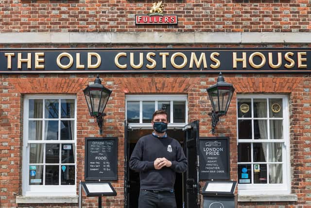 Paul Stephens, manager at the Old Customs House in Gunwharf Quays welcomes back visitors both indoors and out. Picture: Mike Cooter (170521)