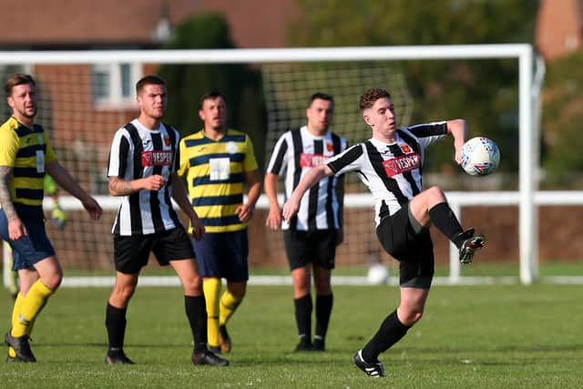 Hayling United (black/white) in action against Paulsgrove earlier this season. Picture: Chris Moorhouse
