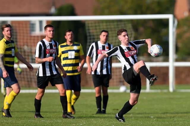 Hayling United (black/white) in action against Paulsgrove earlier this season. Picture: Chris Moorhouse
