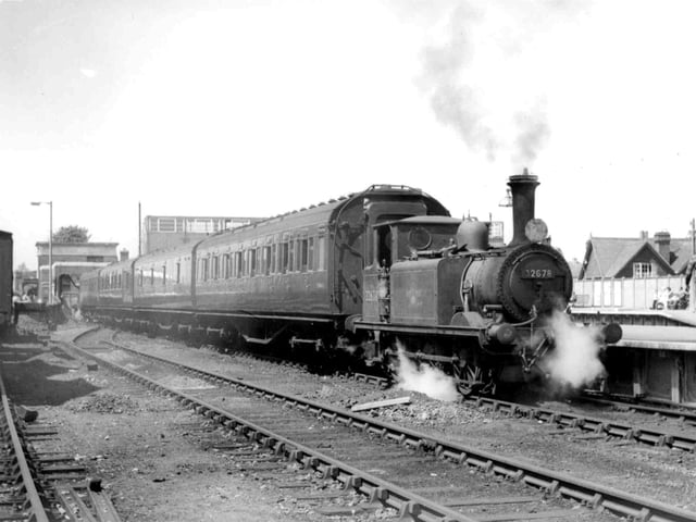 The Hayling Billy at Havant. Number 4 in the series of railway photographs from Michael G. Harvey was taken in June 1962. It shows 'A1X' 0-6-0 tank No.32678 ready to leave the bay platform adjacent to Havant down main platform. Weighing just 28 tons, these diminutive locos were ideal for the four and a half mile journey to Hayling as they had to pass over the wooden bridge that crossed Langstone Harbour. Thanks to Dr. Beeching, the service ceased running in November 1963 and is still much missed to this day..