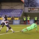 Averaging 3.5 goals per league game - Hawks' Bedsente Gomis scores in a 4-2 home National League South win over Hungerford on January 2. Picture: Chris Moorhouse