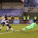 Averaging 3.5 goals per league game - Hawks' Bedsente Gomis scores in a 4-2 home National League South win over Hungerford on January 2. Picture: Chris Moorhouse