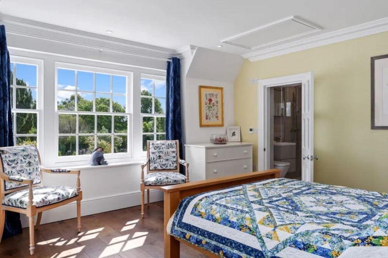 The listing says: "The Grade II listed building stands proudly on grounds approaching one acre and provides flexible 7258 sq ft of living space including an impressive drawing room with dual aspect and four further ground floor reception rooms, one with a half-timbered wall."