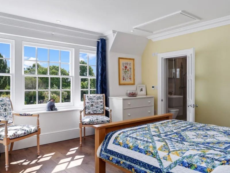 The listing says: "The Grade II listed building stands proudly on grounds approaching one acre and provides flexible 7258 sq ft of living space including an impressive drawing room with dual aspect and four further ground floor reception rooms, one with a half-timbered wall."