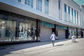 Commercial Road looks eerily empty with Primark shut and only one person visible on the street as the pandemic grips Portsmouth.