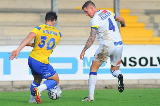 Joe Oastler in action for Hawks on his FA Cup return to Plainmoor. Picture: Martyn White