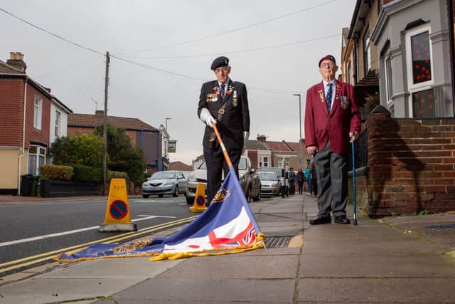 Observing a minute s silence at 11am, Clive Sutton and fellow veteran, Andy Long in Stamshaw road, Portsmouth.

Picture: Habibur Rahman