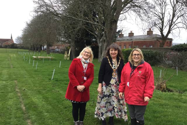Mayor of Gosport, Cllr Kathy Jones, is joined at the tree plant by headteacher, Emma Howlett (right) and school governor, Cllr Julie Westerby.