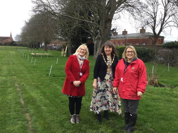 Mayor of Gosport, Cllr Kathy Jones, is joined at the tree plant by headteacher, Emma Howlett (right) and school governor, Cllr Julie Westerby.