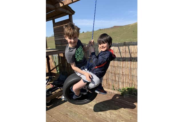Leo and Max McHugh, 8 and 6, are taking on a back garden marathon to raise funds for the NHS