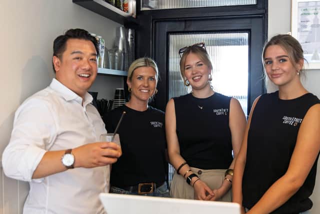 Alan Mak MP with Roxie Tricker (second left) and members of staff at the South Street Coffee Company in Emsworth