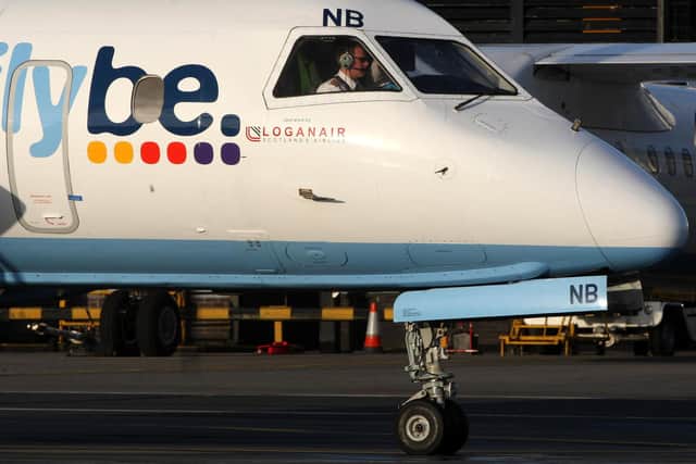 A pilot completing final checks on a Flybe plane. Picture: Andrew Milligan/PA Wire