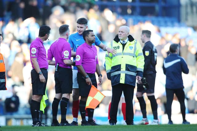 George Hirst protests to referee Benjamin Speedie after the final whistle following Pompey's goalless draw with Wycombe. Picture: Joe Pepler