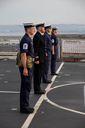 HMS Duncan's crew pictured as they returned to the ship following the vessel's 18-month refit.