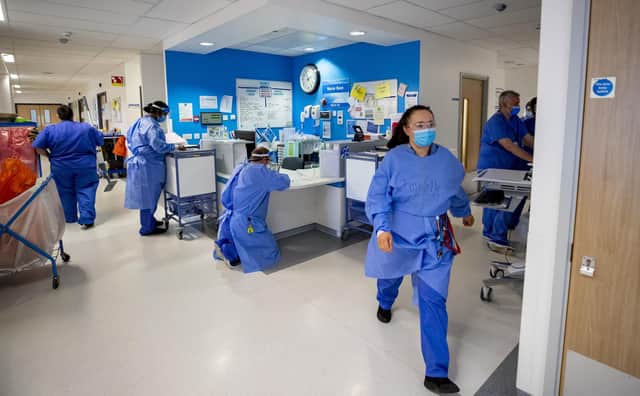 File photo dated 20/10/20 of hospital staff on a Covid-19 ward. Photo: PA Wire/PA Images
