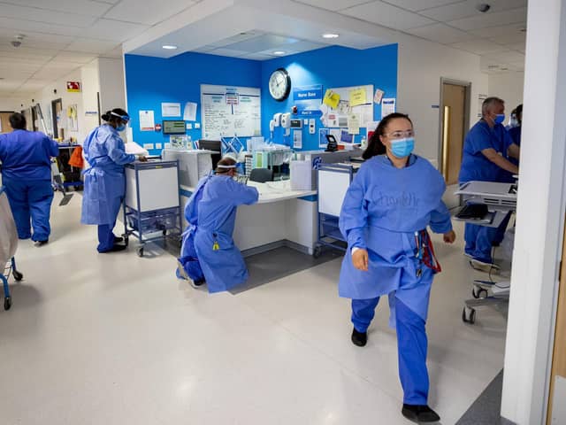 File photo dated 20/10/20 of hospital staff on a Covid-19 ward. Photo: PA Wire/PA Images