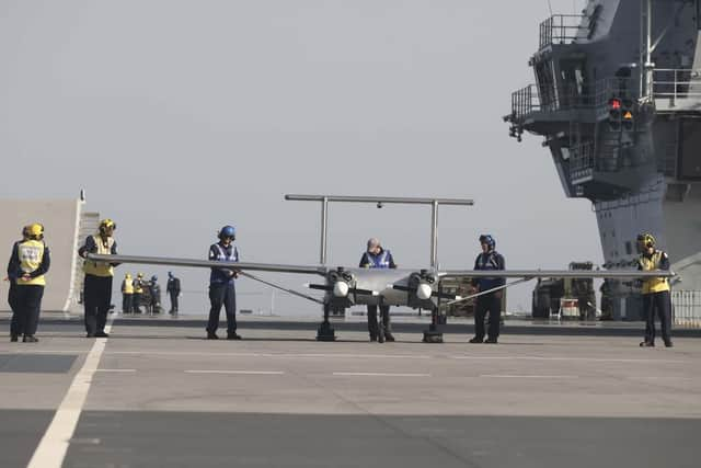 It is the first time a pilotless aircraft has taken off and landed on HMS Prince of Wales. Picture: LPhot Unaisi Luke/Royal Navy.