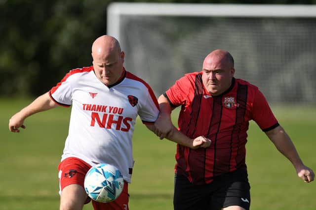 Rowner Rovers (white shirts) v Horndean United. Picture: Neil Marshall