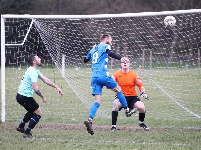Barry Jeans about to head in AC Copnor's second goal. Picture: Stuart Martin