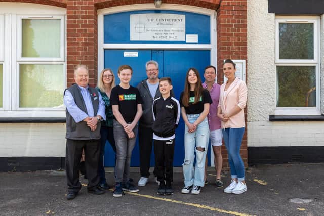 From left, Co-op manager Dave Brown, Laura Jones, Tom Jones, Colin Rattley, Louie Rattley, Mia Rattley, Lee Rattley and Dawn Rattley. Picture: Mike Cooter (300422)