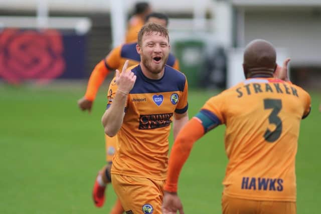 Tommy Wright celebrates his stunning goal for Hawks in their 3-0 FA Cup fourth qualifying round win at Bath City in October. Pic: Kieron Louloudis.