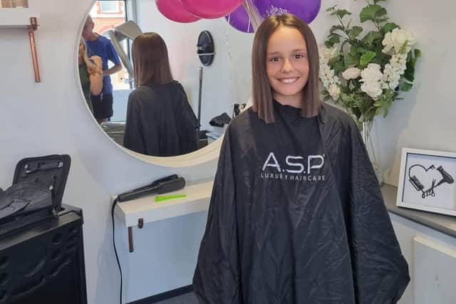 10-year-old Cacey Gawn at The Hair Lounge, in Cosham, after chopping off her hair and raising over £700 for the Little Princess Trust.