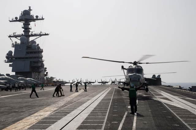 A British Royal Navy Commando Wildcat AH1 lands on the flight deck of the world’s largest aircraft carrier USS Gerald R. Ford. Picture: MC3 Simon Pike/Royal Navy.
