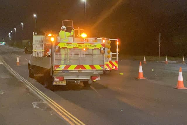 Workers closing off Eastern Road after a man, 27, was hit by a car.
Picture: Tom Cotterill