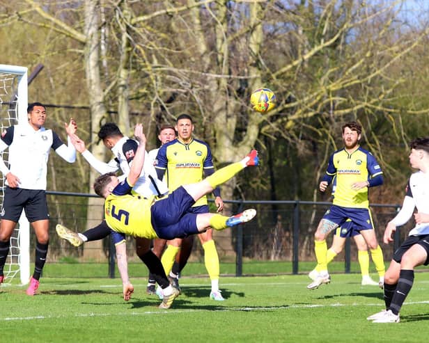 Gosport Borough defender Ryan Woodford tries an acrobatic effort in the stalemate at Kings Langley Picture: Tom Phillips