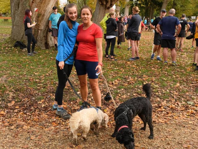 Lucy Campbell, left, and Mary Cooper with dogs Brownly and Monty at the latest Havant parkrun. Picture: Keith Woodland (131121-93)