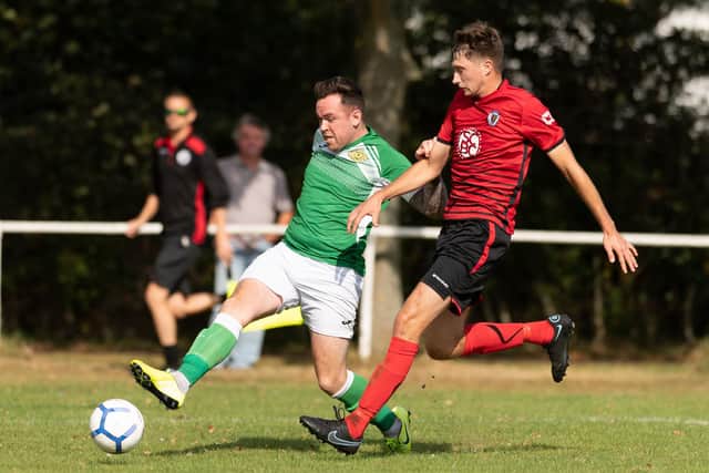 Micky Viggor, left, was sent off on his second Clanfield appearance at Liss. Picture: Keith Woodland