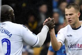 Bryn Morris and Adebayo Akinfenwa in Wycombe colours.