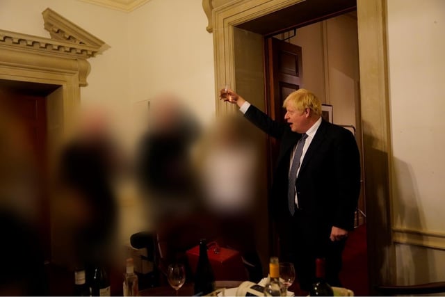 issued by the Cabinet Office showing Prime Minister Boris Johnson at a gathering in 10 Downing Street for the departure of a special adviser, which has been released with the publication of Sue's Gray report into Downing Street parties in Whitehall during the coronavirus lockdown. Issue date: Wednesday May 25, 2022.