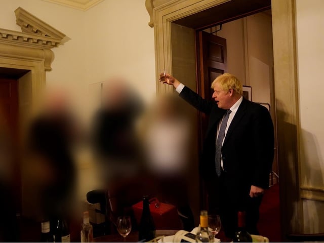 issued by the Cabinet Office showing Prime Minister Boris Johnson at a gathering in 10 Downing Street for the departure of a special adviser, which has been released with the publication of Sue's Gray report into Downing Street parties in Whitehall during the coronavirus lockdown. Issue date: Wednesday May 25, 2022.