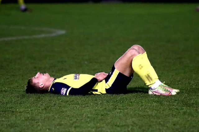 Mason Walsh sums up the feeling of the Gosport Borough players at the final whistle. Picture: Tom Phillips