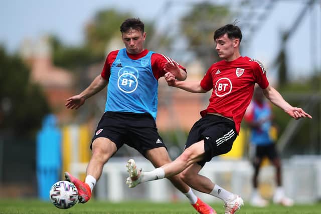 Dylan Levitt, right, trains with Wales ahead of next month's European Championships. Picture: Fran Santiago/Getty Images