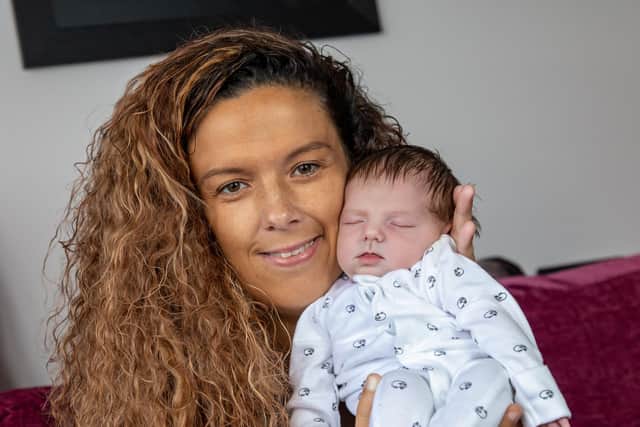 Mum Angharad Woolley and baby Esmae who was born at home without medical assistance. Picture: Mike Cooter (270822)