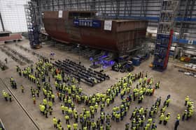 Guests and workers observe the progress on HMS Venturer, the first of the Type 31 frigates. This came after the 'first cut of steel' ceremony for the second-in-class Type 31 frigate HMS Active at Babcock's Rosyth facilities on January 24 Picture: Jeff J Mitchell/Getty Images