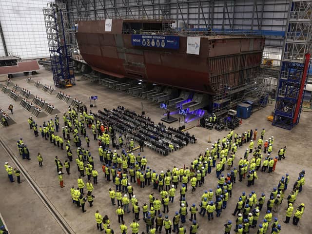 Guests and workers observe the progress on HMS Venturer, the first of the Type 31 frigates. This came after the 'first cut of steel' ceremony for the second-in-class Type 31 frigate HMS Active at Babcock's Rosyth facilities on January 24 Picture: Jeff J Mitchell/Getty Images